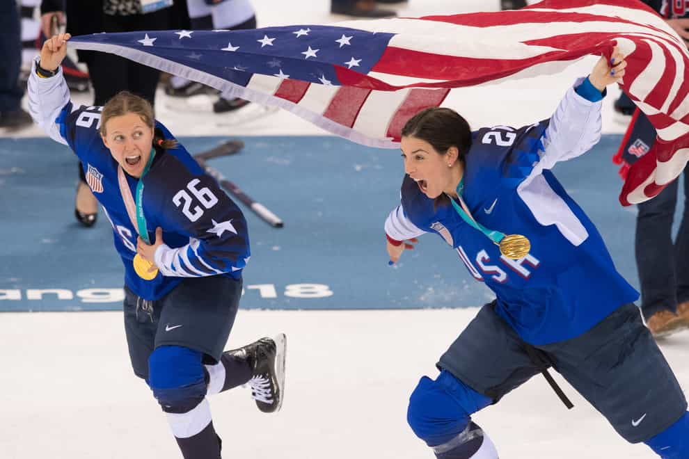Knight, right, celebrates after winning Gold in Pyeongchang in 2018 (PA Images)