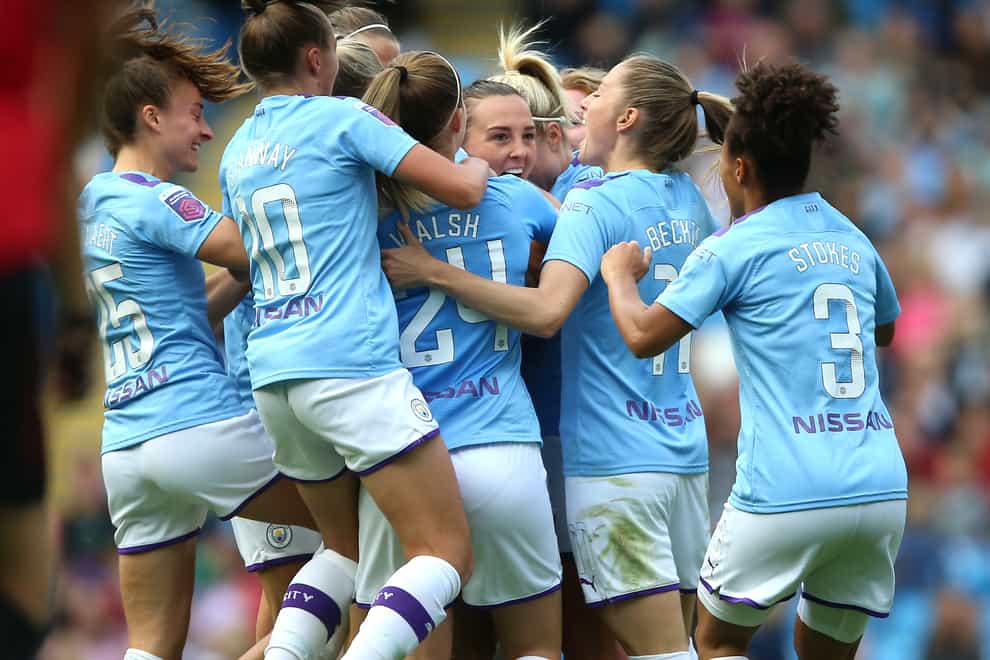 Manchester City players celebrate after Caroline Weir's goal (PA Images)