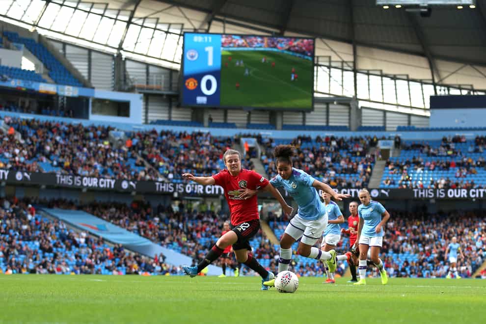 The inaugural Manchester derby saw record crowds at the Etihad stadium (PA Images)