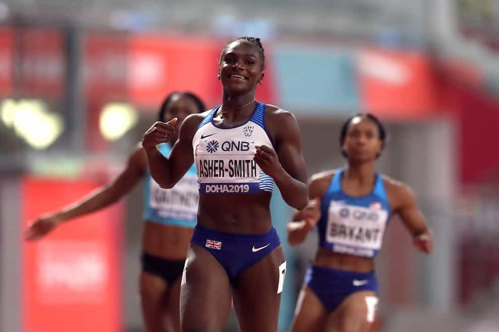Dina Asher-Smith after becoming 200m world champion (PA Images)