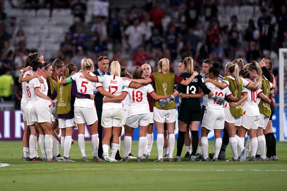 The England team huddle together after their World Cup semi-final defeat to the USA (PA Images)