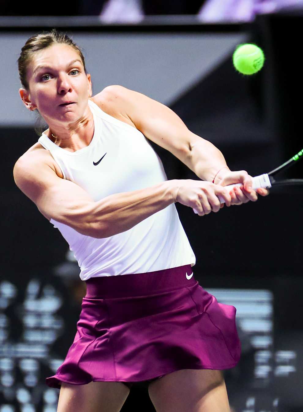 Simona Halep showed little sign of the back injury that has plagued the latter part of her season (PA Images)
