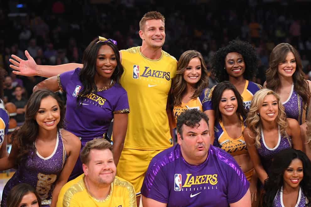 Williams and Corden joined the Lakers cheerleaders at half-time (PA Images)