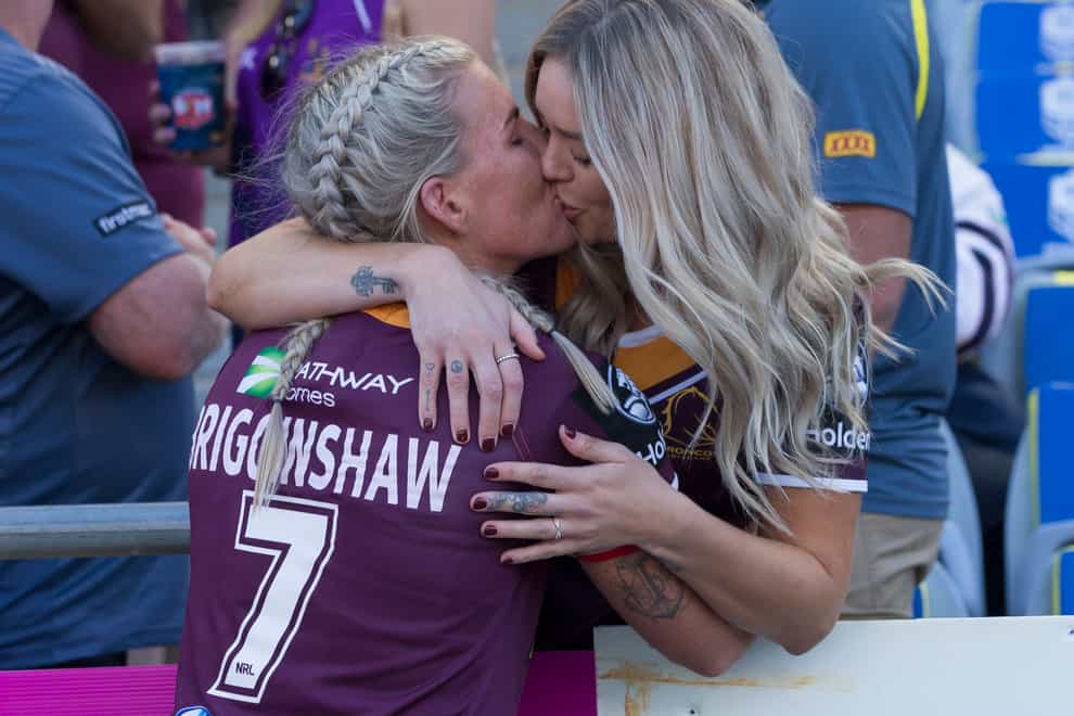 Brigginshaw kisses girlfriend Kate Daly after winning the NRLW in 2018 (PA Images)