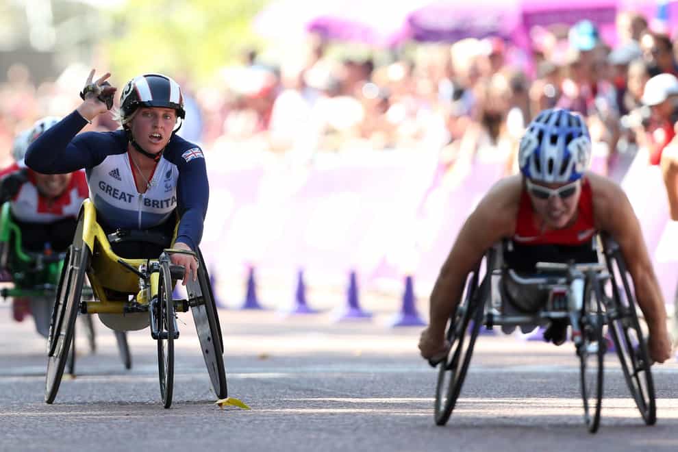 Great Britain's Shelly Woods crosses the line to take silver in the Women's T54 Marathon (PA Images)