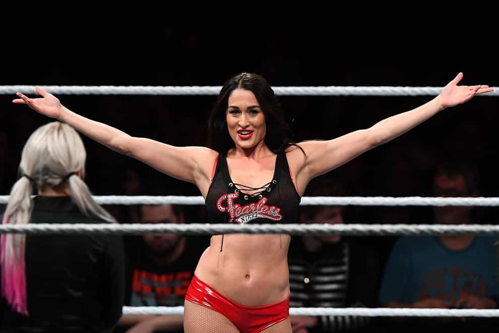 The WWE star has retired from the ring but is excited to welcome a child (PA Images)