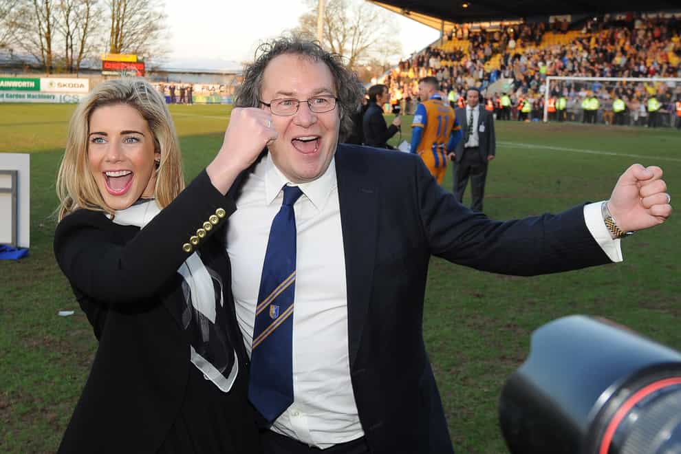 Carolyn and John Radford celebrate Mansfield's promotion to League Two in 2013 (PA Images)