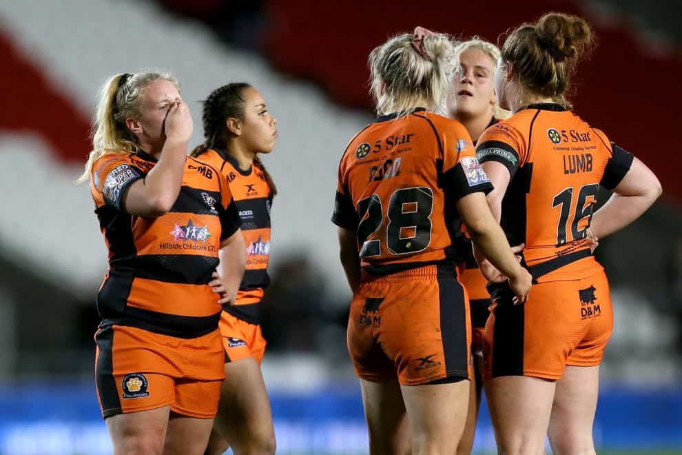 Castleford Tigers look dejected after losing the WSL final (PA Images)