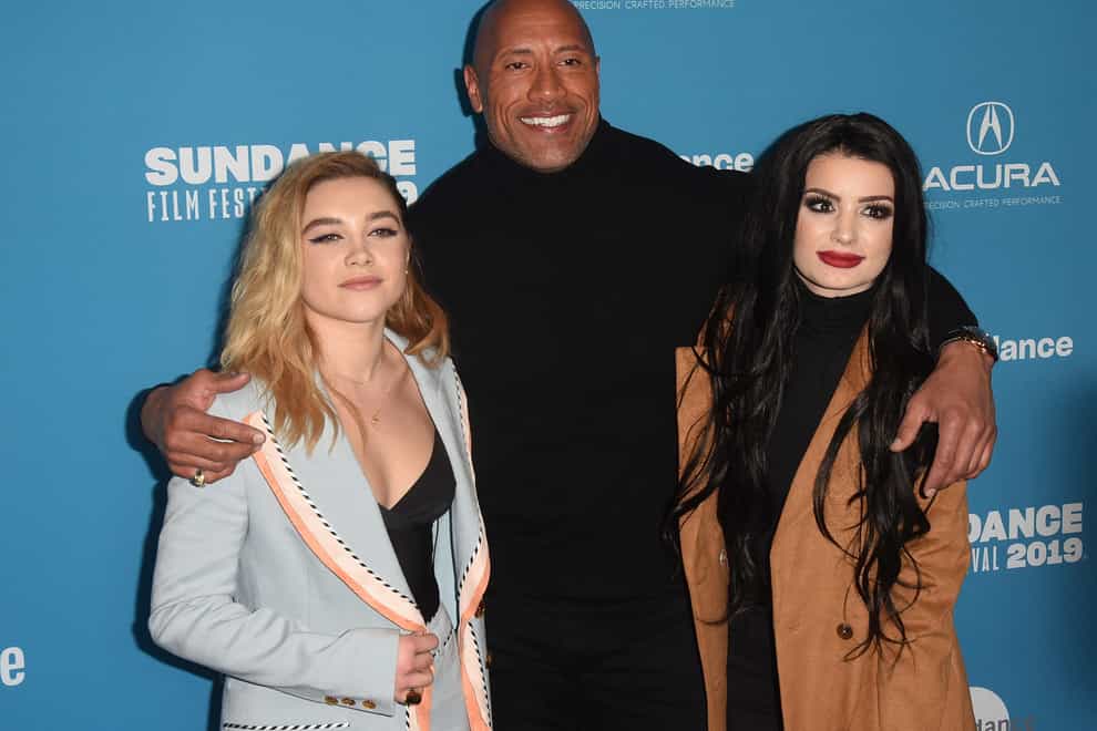 Paige (right) has ambitions to act alongside 'The Rock' (PA Images)