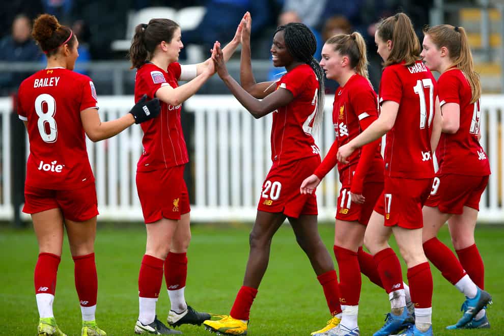 Liverpool's Rinsola Babajide (centre) celebrates scoring her hat-trick and her side's fifth goal against Blackburn (PA Images)
