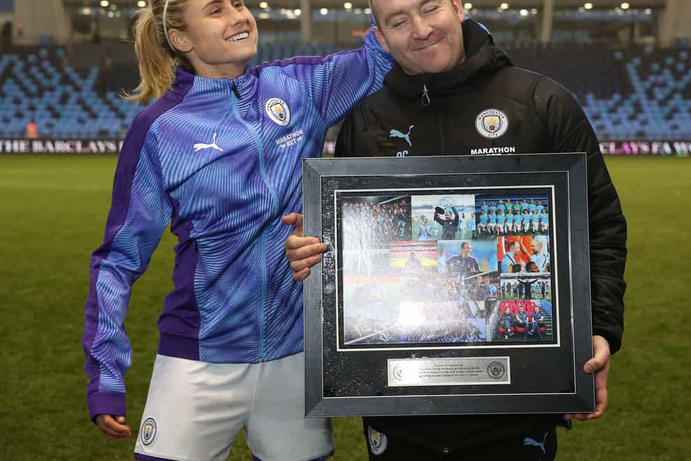 Cushing alongside Man City captain Steph Houghton before his last game in charge (PA Images)