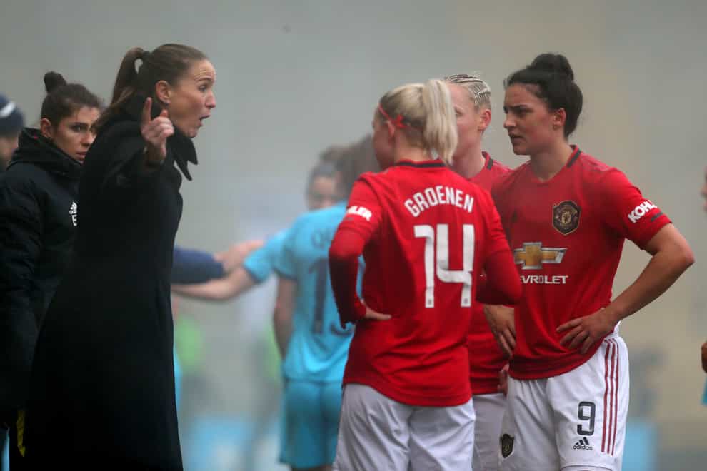 Casey Stoney with her Man Utd player (PA Images)
