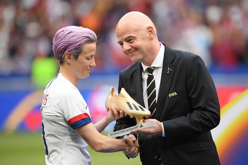 Infantino handing US star Megan Rapinoe her golden boot at the 2019 World Cup (PA Images)