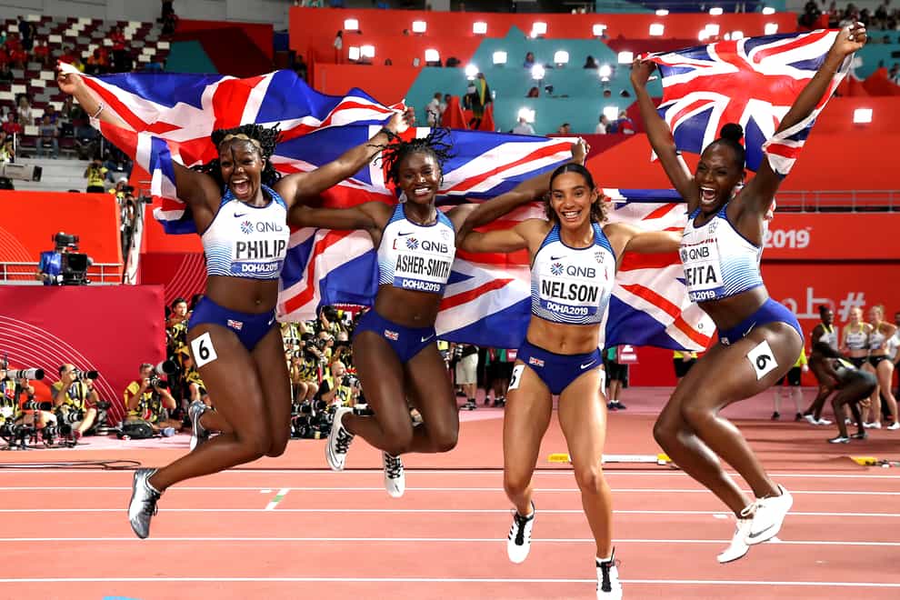 (L-R) Asha Philip, Dina Asher-Smith, Ashleigh Nelson, Daryll Neita celebrate their 4x100m silver in Doha (PA Images)