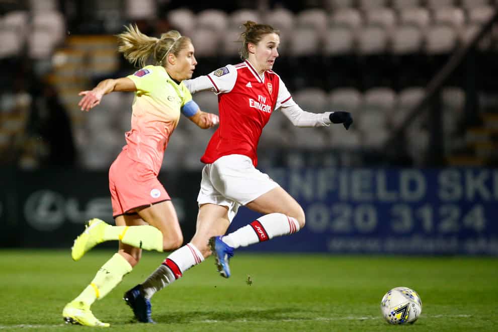 Miedema fending off England captain Steph Houghton in WSL match (PA Images)