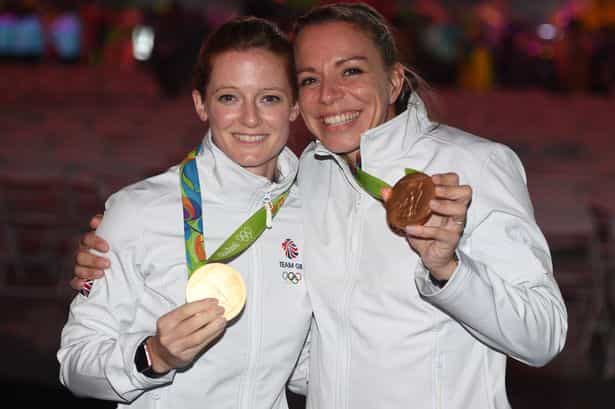 Helen (left) and Kate Richardson-Walsh pose with their Olympic gold medals (katerichardson-walsh.com)