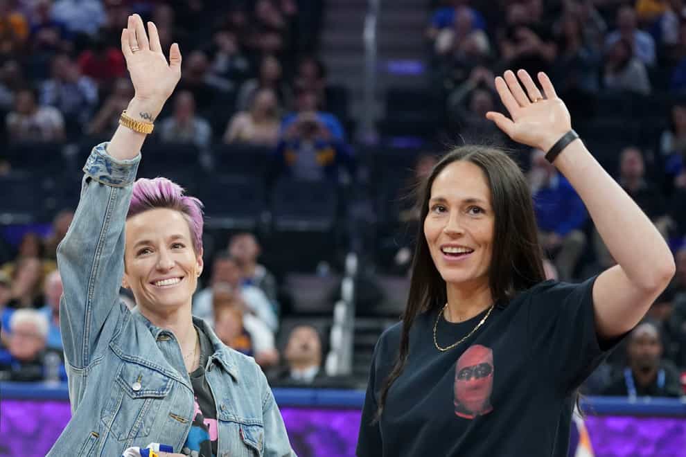 Rapinoe, left, has been with Bird, right, since 2017 (PA Images)