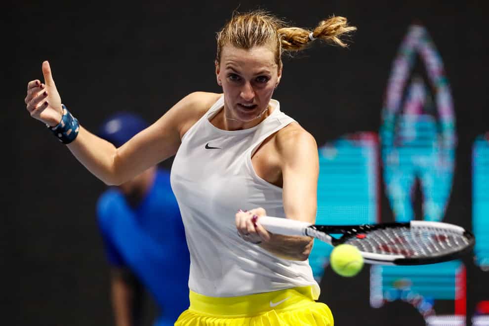 Petra Kvitova reached the quarter-finals after she beat Alison Van Uytvanck  7-6 (1), 1-6, 6-2 (PA Images)