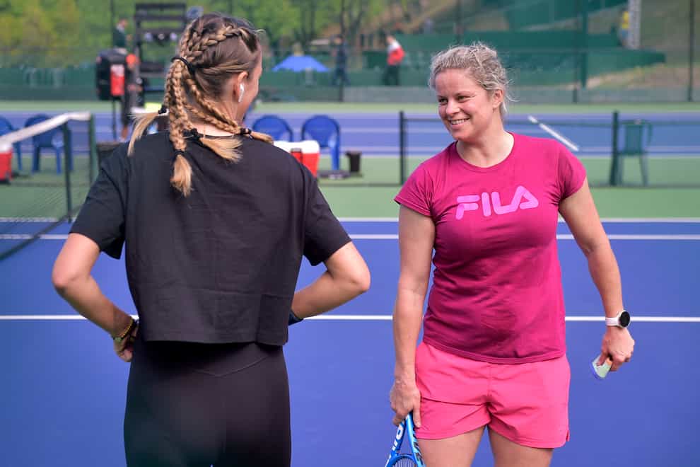 Clijsters pictured training with two-time Australian Open champion Victoria Azarenka last week (PA Images)