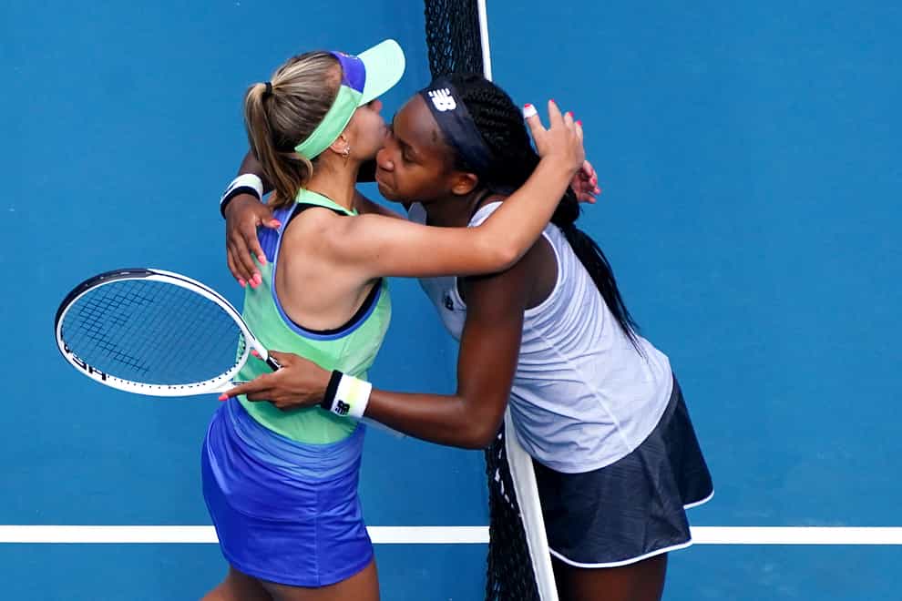Gauff and Kenin embrace at the net in Melbourne (PA Images)