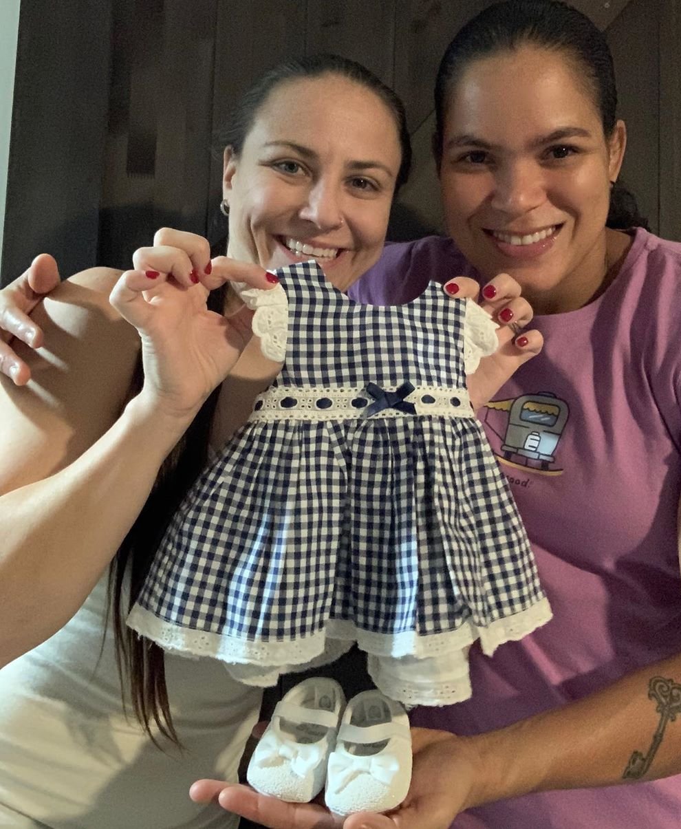 Nunes, right, is having a baby with her fiancee Ansaroff (Instagram: Amanda Nunes)