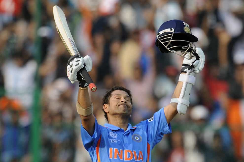 Tendulkar celebrates scoring a century on the way to India's 2011 World Cup victory (PA Images)