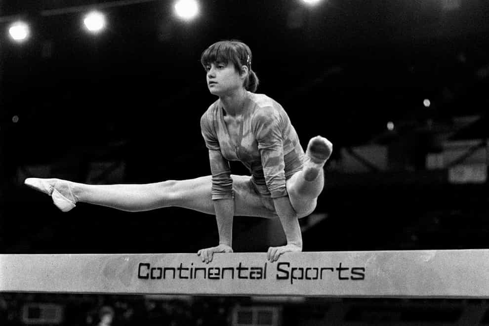 Comaneci was the first woman to score a perfect 10 at the Olympics (PA Images)