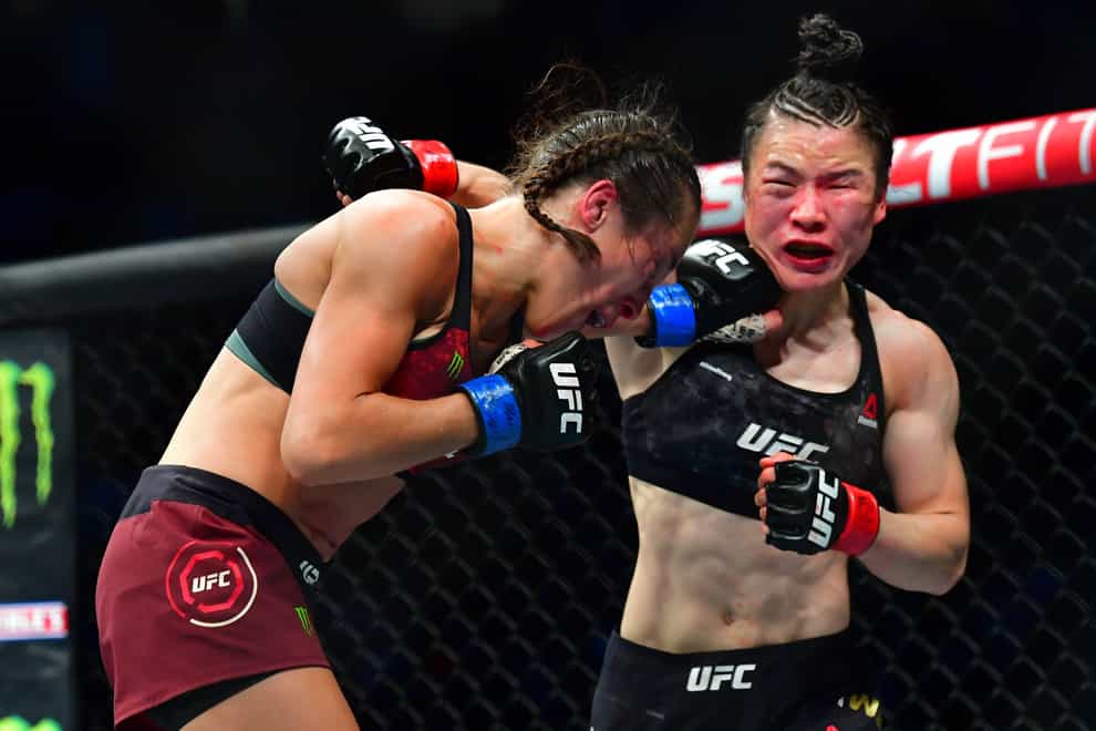 Zhang Weili and Joanna Jedrzejczyk were involved in a fight of the year contender on Saturday night (PA Images)