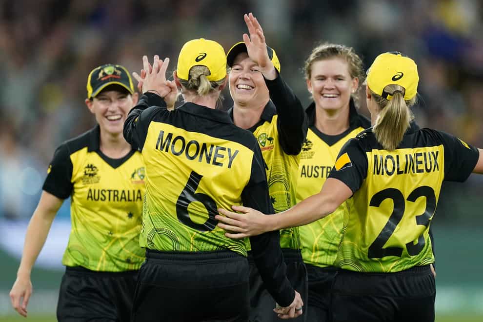 Mooney celebrates Australia's T20 World Cup win alongside her teammates (PA Images)