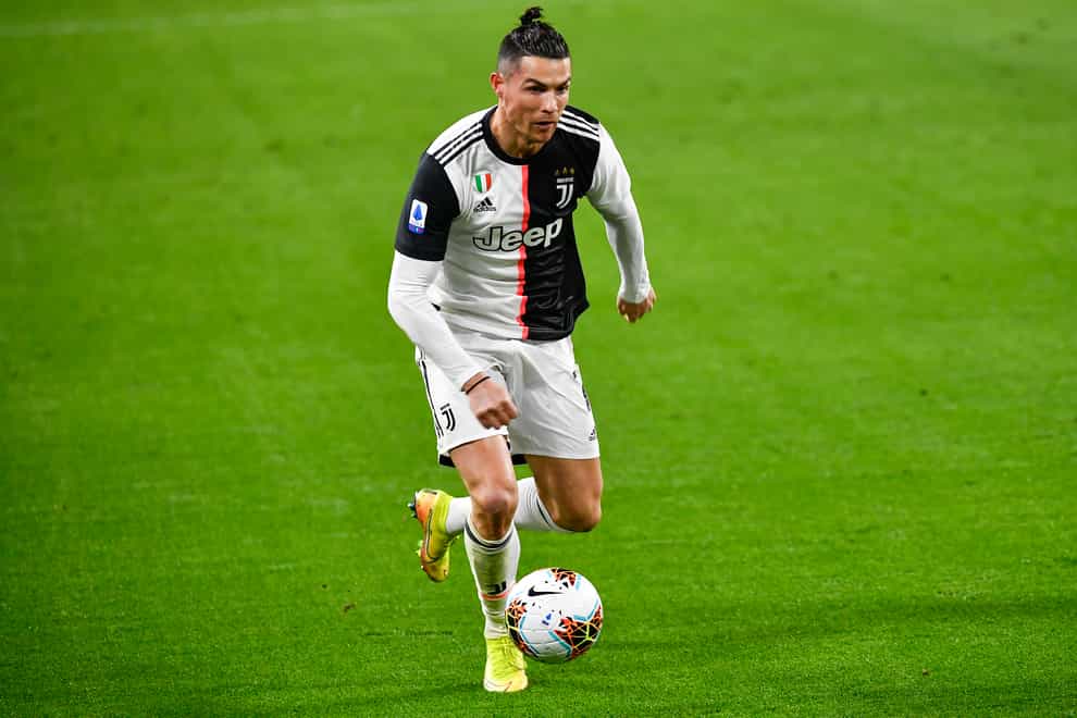 Ronaldo in action against Milan before his quarantine (PA Images)