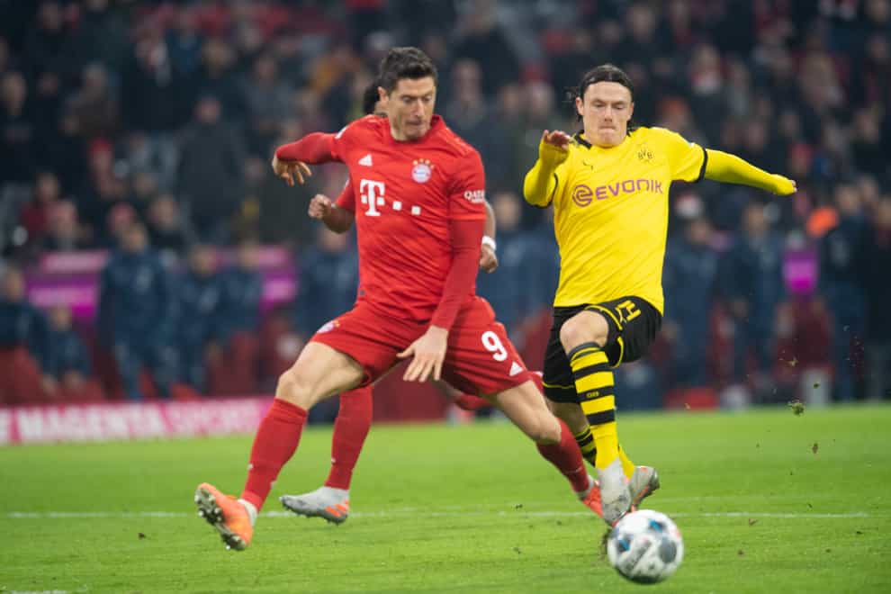 Bayern Munich and Borussia Dortmund are first and second in the Bundesliga (PA Images)