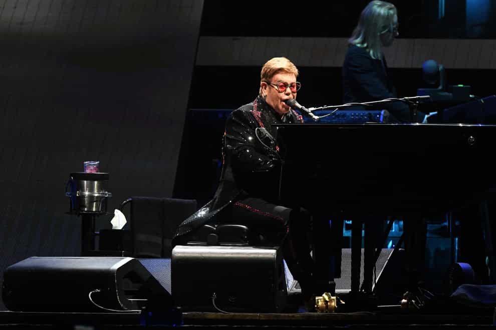 Sir Elton John is hosting the virtual gig with a host of big name contributors  (PA Images)