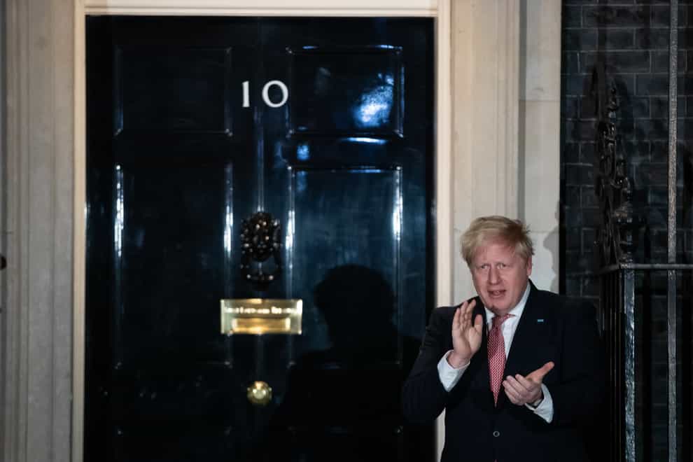 Boris Johnson, outside No 10 last Thursday, says he is still experiencing symptoms (PA Images)