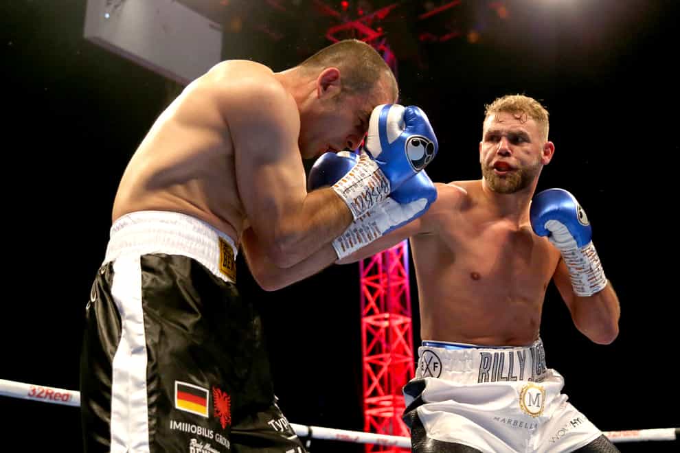 Saunders uses a punchbag in his video to demonstrate how to hit women (PA Images)  