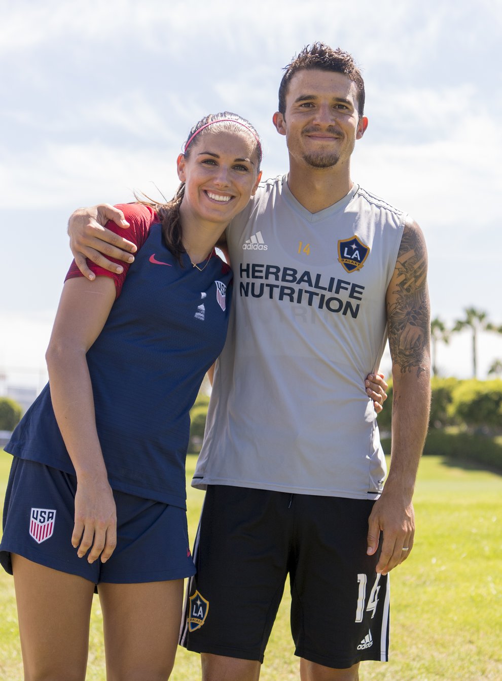 Alex Morgan with husband Servando Carrasco who will not be present at the birth of their first child due to hospital restrictions  (PA Images)