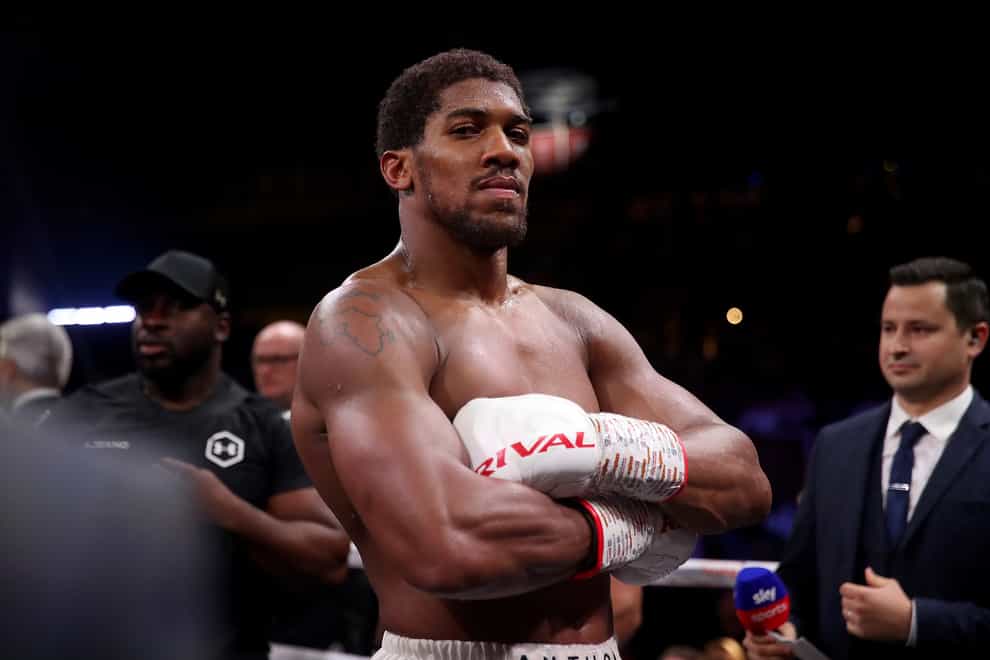 Joshua has idolised Mike Tyson since taking up boxing (PA Images)