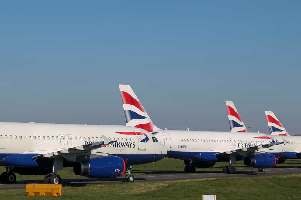 Up to 80 per cent of British Airways staff, apart from pilots, are due to be suspended (PA Images)
