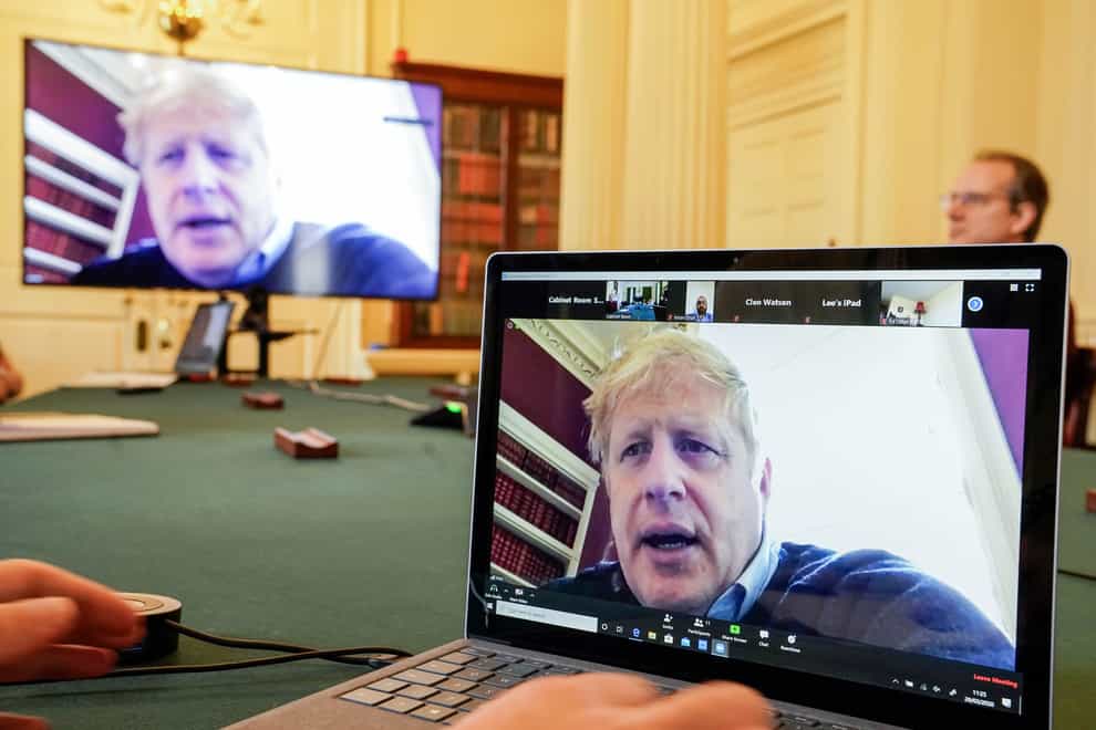 The Prime Minister has been chairing meetings via video link during his isolation (PA Images)