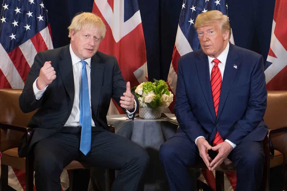 The President referred to Mr Johnson as a 'good friend' at yesterday's press conference (PA Images)