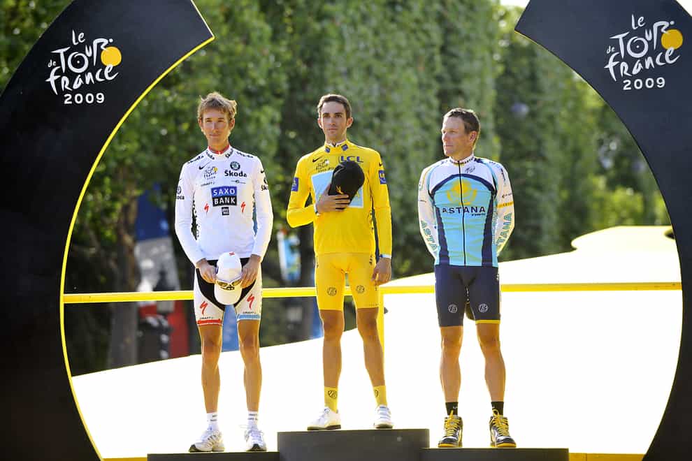 Contador (centre) won the 2009 Tour de France as Lance Armstrong (right) finished third (PA Images)
