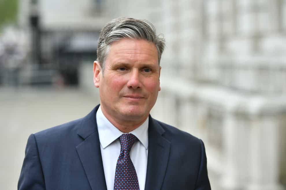 Keir Starmer believes the Government is reluctant to make decisions in Boris Johnson's absence (PA Images)