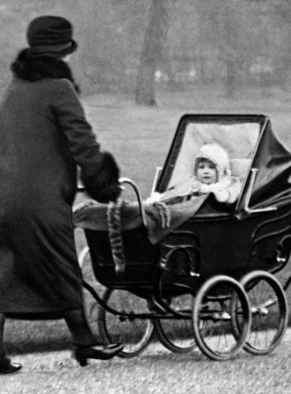 The Queen being pushed in a pram in 1929 (PA Images)