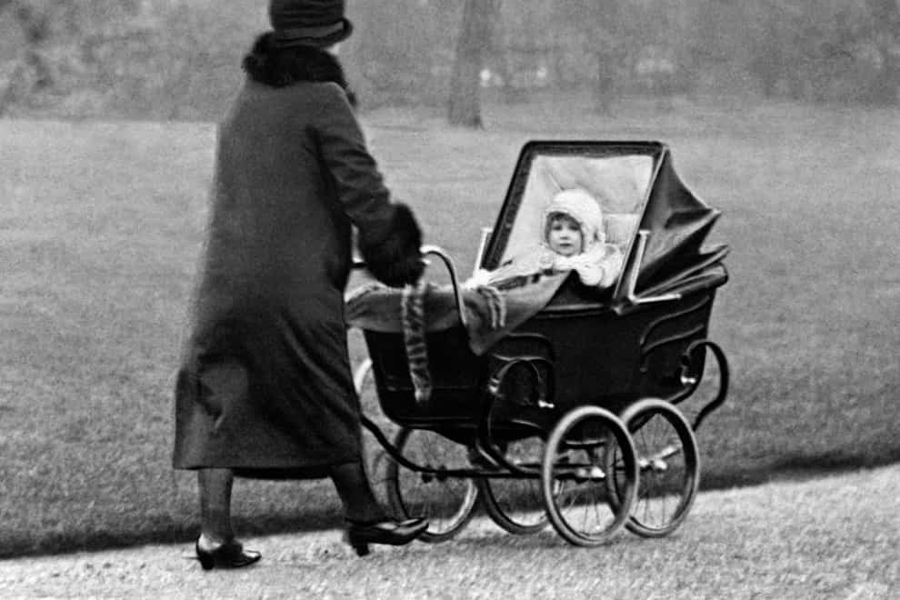 The Queen being pushed in a pram in 1929 (PA Images)