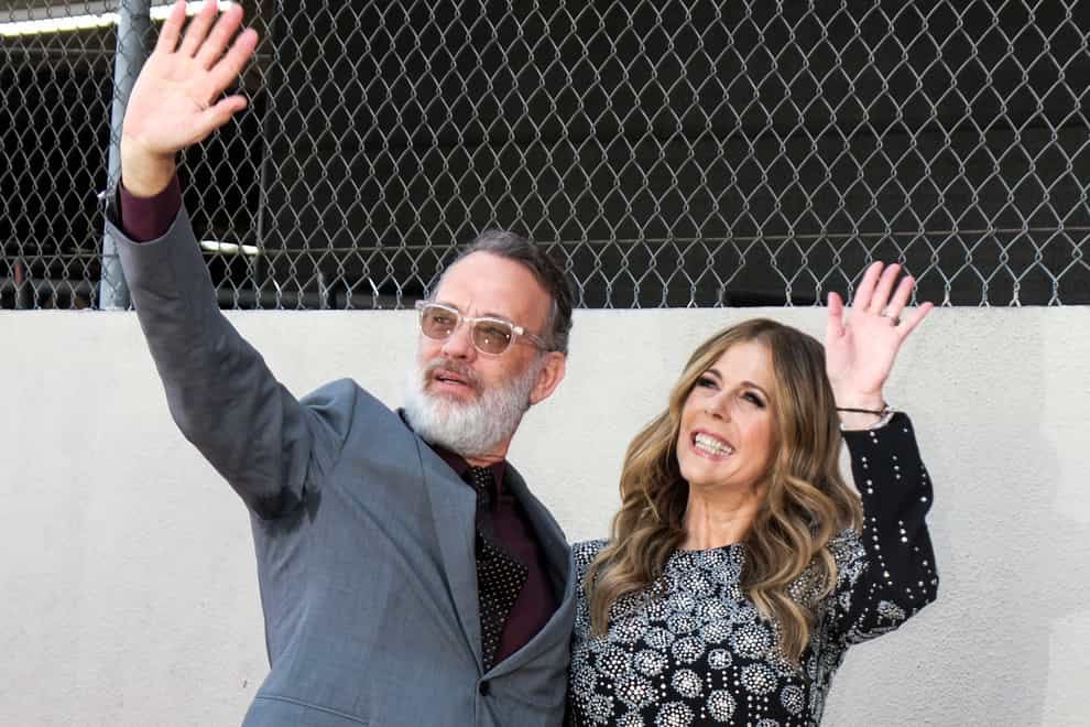 Hanks and his wife, Rita Wilson, fell ill with the virus in Australia last month (PA Images)