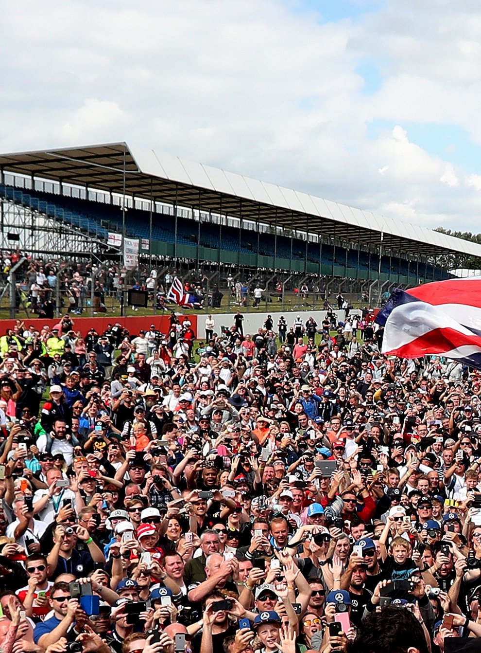 Lewis Hamilton will have to celebrate without his home fans should he win the race again this year (PA Images)