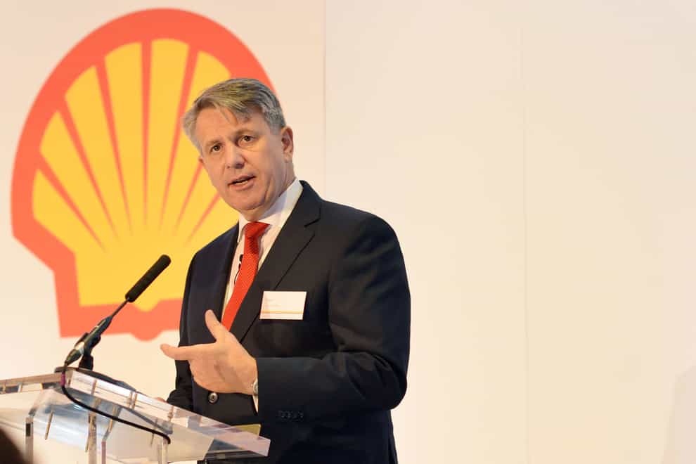 Shell slashes dividend