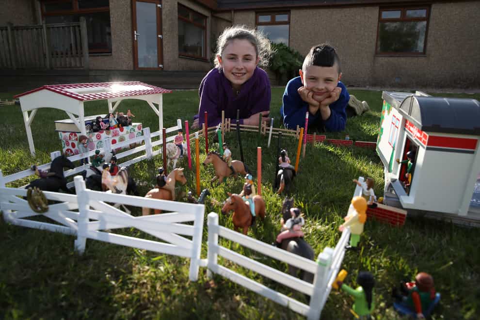 Ailie and Hamish Muirhead beside their toy recreation of the Royal Highland Show in Edinburgh
