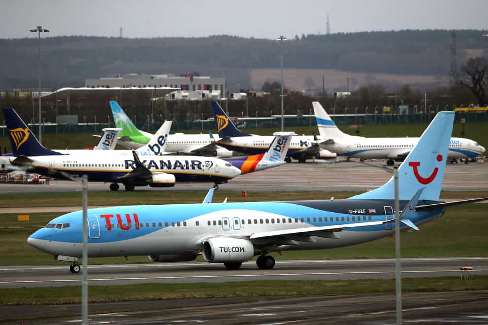Tui has said thousands of jobs would be cut worldwide (PA Images)