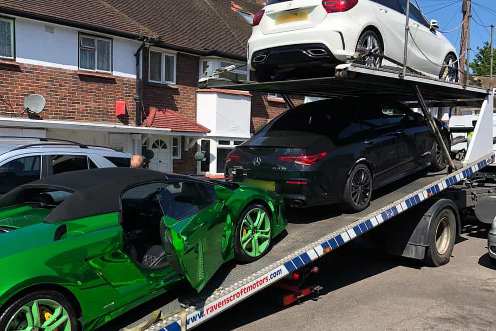 The Lamborghini being loaded onto a recovery vehicle