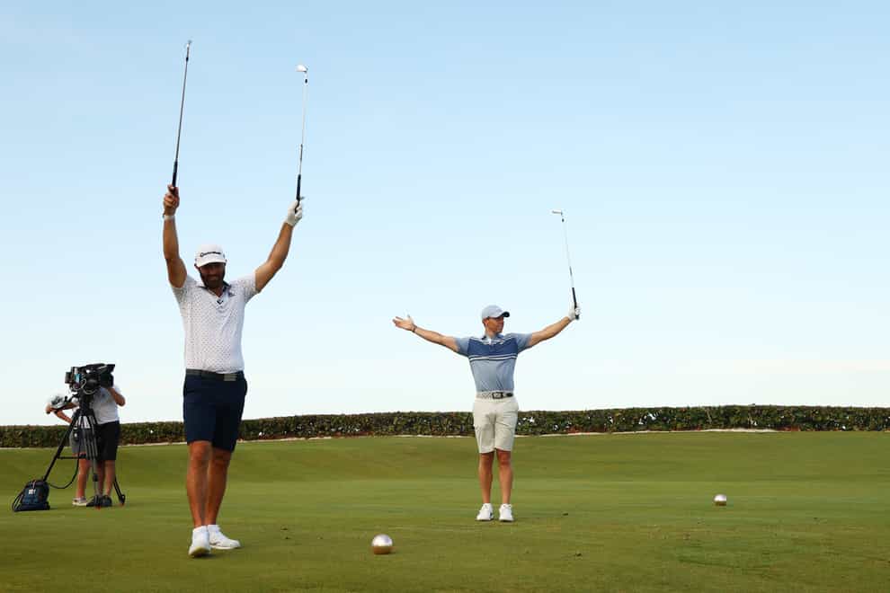 Johnson and McIlroy celebrate their victory (PA Images)